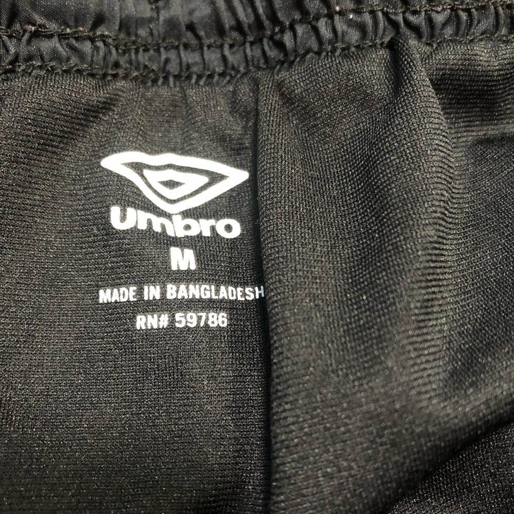 Black and white striped Umbro brand shorts. Size medium . - Picture 4 of 6
